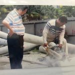 Founder Ricky Lim of GL BOSUN DIAMOND TOOLS (M) SDN BHD observing product performance in photos